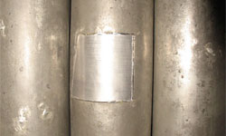 Prospektpfeife mit früher eingesetztem Metallflicken
